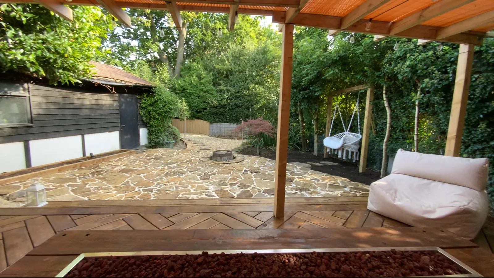 York stone crazy paving and herringbone decking installed by HLS in Horsham